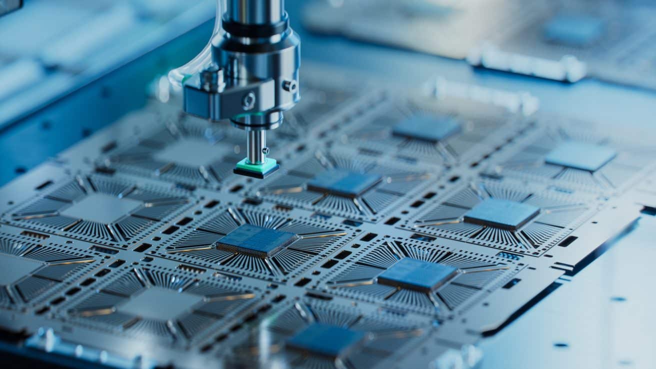 close-up-of-silicon-die-are-being-extracted-from-semiconductor-wafer-and-attached-to-substrate-by-pick-and-place-machine-computer-chip-manufacturing-at-fab-semiconductor-packaging-process-2