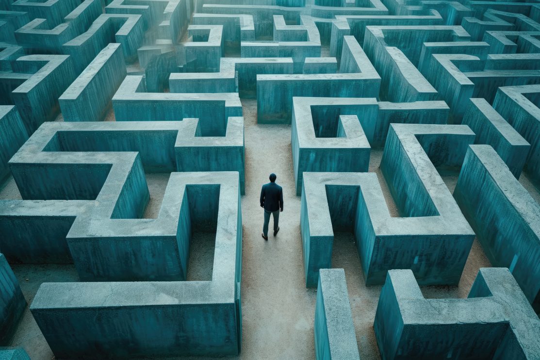 person-navigating-a-maze-or-labyrinth-symbolizing-problem-solving-and-strategy-a-person-stuck-in-a-maze-trying-to-think-of-a-way-out-a-businessman-navigating-through-a-maze