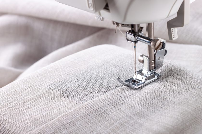 modern-sewing-machine-presser-foot-and-item-of-clothes-sewing-process-handmade-hobby-business