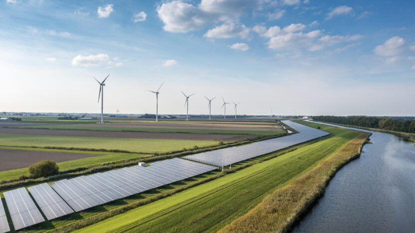 Solar panels and wind turbines generating renewable energy for green and sustainable future